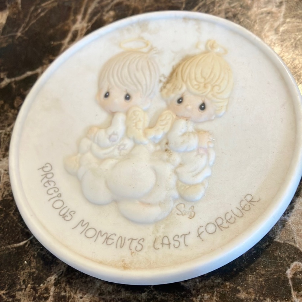 Precious moments collector piece
